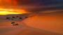 game_systems:call_of_cthulhu:australian-desert-sand-sunset-clouds_1920x1080.jpg